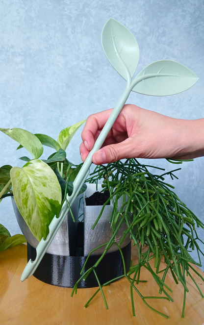 Grow Probe soil moisture meter in front of Gecko Planter watering tray.